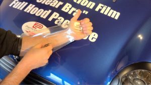 Cutting Paint protection film on my arm